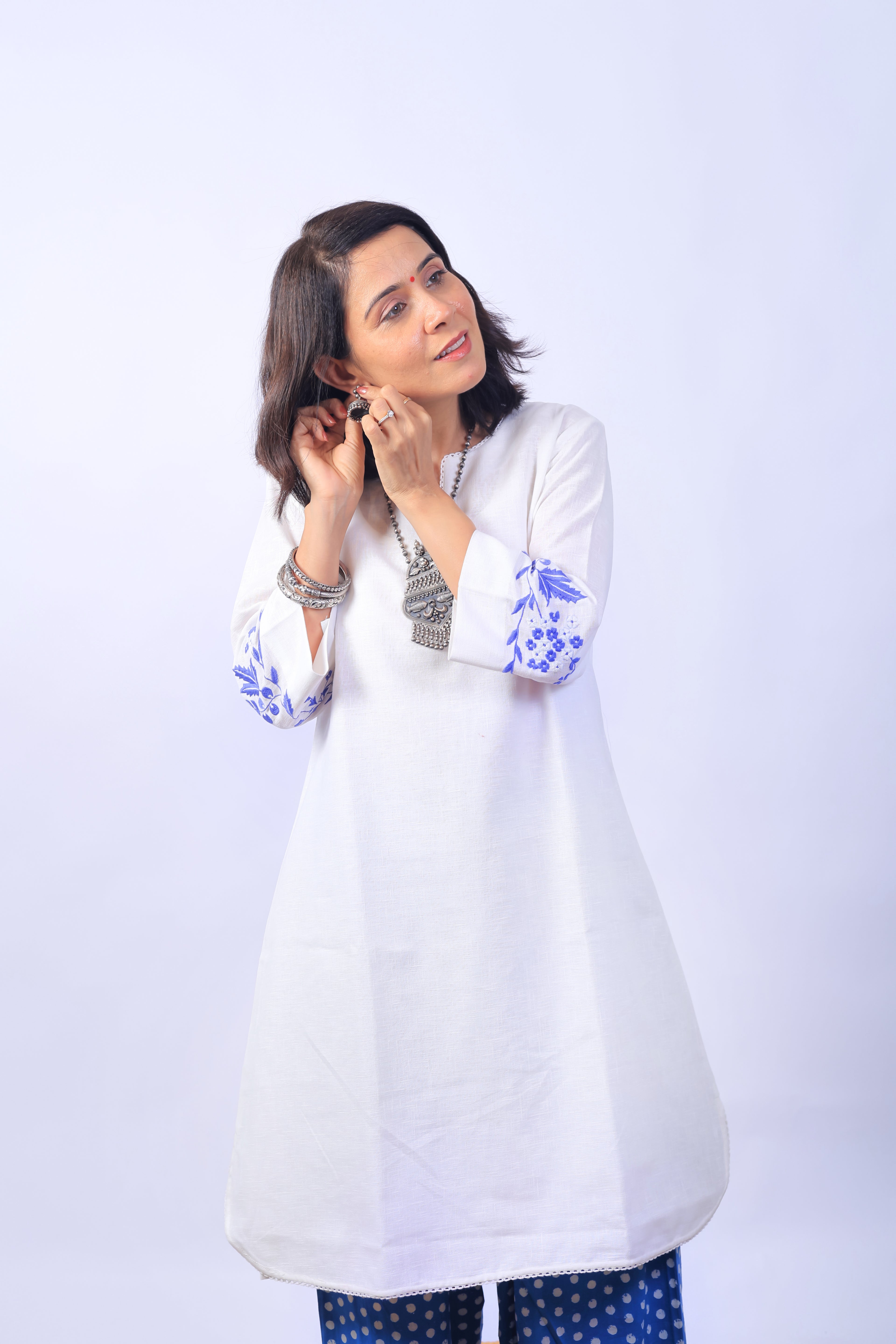 White  embrioded farsi suit